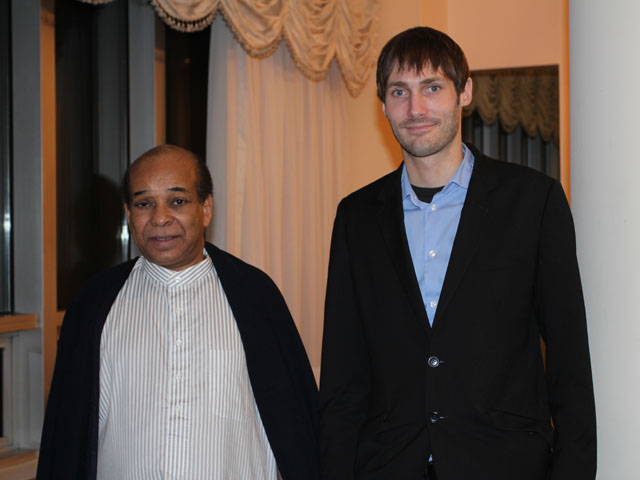 Matthew VanDyke with Libyan Ambassador Abdel Rahman Shalgham at the Libyan Mission to the United Nations after the war