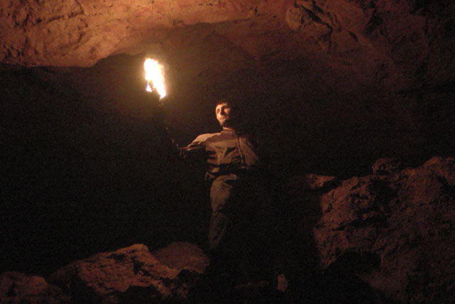 Matthew VanDyke in a bat infested cave in Iraq