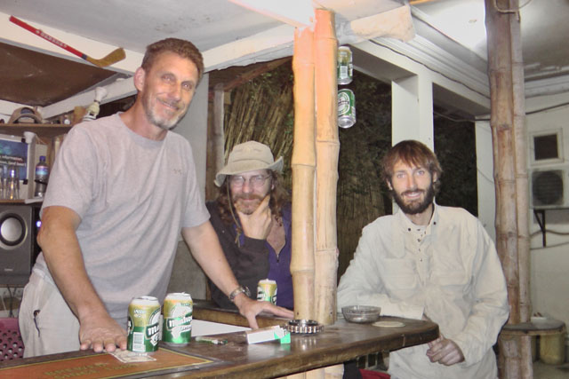 Matthew VanDyke with Tim Lynch and Ken Kraushaar at the Taj Mahal Guest House Tiki Bar in Jalalabad Afghanistan